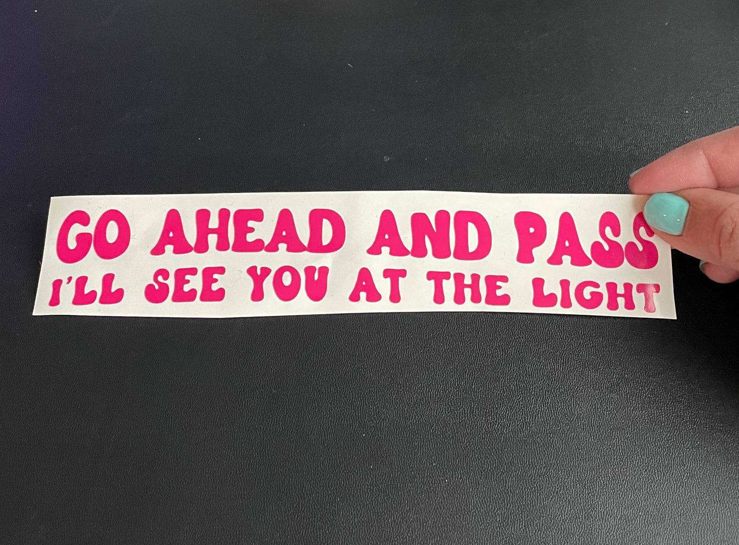 See you at the light pink wavy text decal